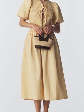 Anthropologie Pale Yellow Smocked Midi Dress